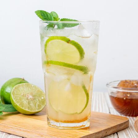 A glass of lemon honey water