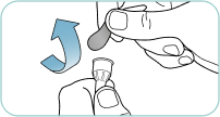 Removing paper tab from outer needle shield.