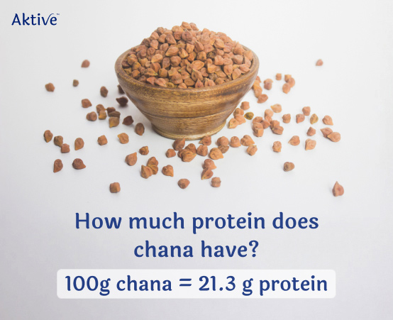 Dry organic kala chana (desi chickpeas) in a rustic bowl.