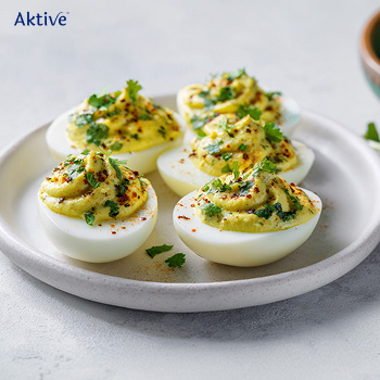 Devilled eggs on a white plate