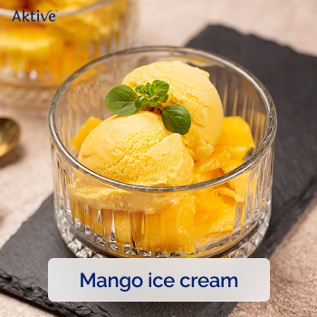 Mango ice cream in a glass bowl