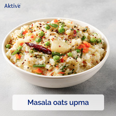 Oats upma with vegetables in a bowl. 
