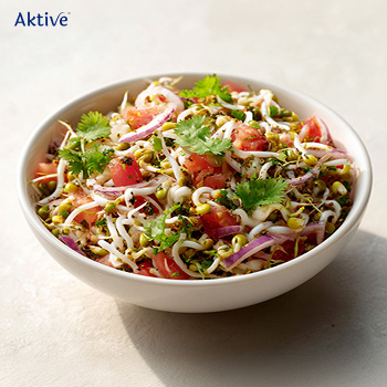Bowl of sprout salad with vegetables