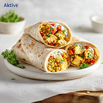 Paneer wrap on a white plate